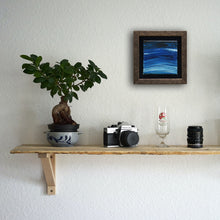 Load image into Gallery viewer, Waves of Thunder, a painting by Aria Luna, framed and displayed above a living room shelf